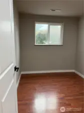 Downstairs bedroom, has closet.