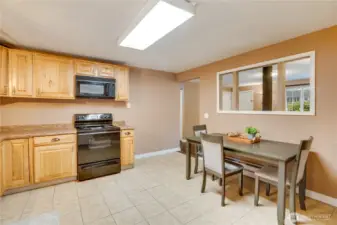 Bright and functional, this kitchen is designed for both style and practicality and the tile floors make clean up easy.