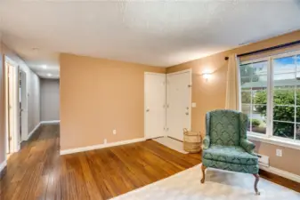 Notice the convenient coat closet next to the front door. Let's go explore the primary and two secondary bedrooms.