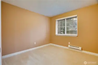 This third bedroom is all about flexibility—perfect as a guest room, home office, or creative space.