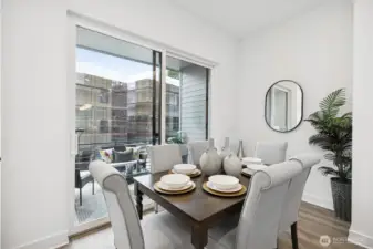 Dining with access to covered patio (Facade, Ext Colors, Interior Photos & Floor Plans for illustrative purposes only. Actual Facade, Ext Colors, Interiors & Floor Plans may differ.)