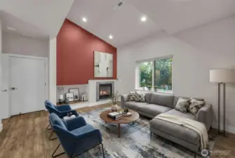 (Virtually Staged) Living room with high ceilings and cozy gas fireplace.