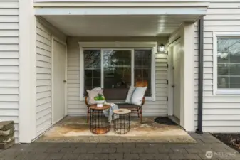 Covered patio area door on left is for storage, door on right enters the dining room