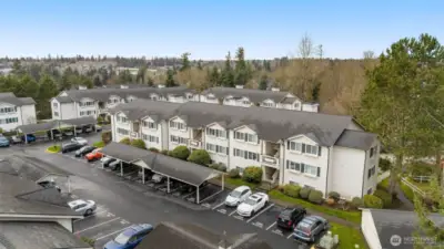 Overview of Building J the pathway to the right and behind the tree takes you to the clubhouse and play area