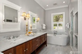 En-suite 5 piece bathroom with jetted tub and dual shower heads.