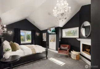 Luxurious master suite with peak-a-boo water and soothing territorial views with a gas fireplace.