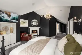 Door was added to connect primary suite to bonus room (can close off).  New carpet and statement chandeliers.