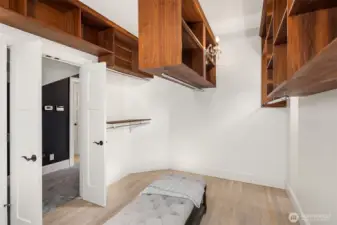 Custom designed large walk in closet.