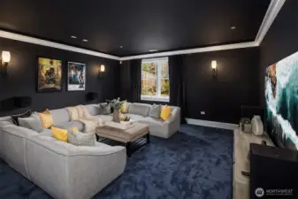 Movie room with Paradigm home theater speakers and wired for projector.