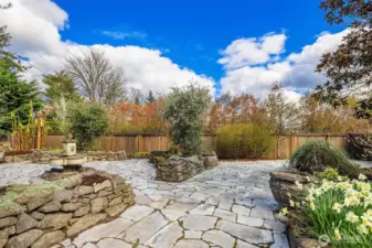 Includes vegetable beds, olive trees, banana plants and Japanese maples.