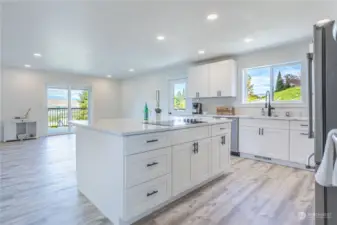 Kitchen Island, Double Oven and stainless steel appliances.