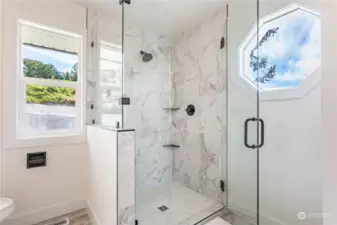 Tile Shower in the primary bathroom