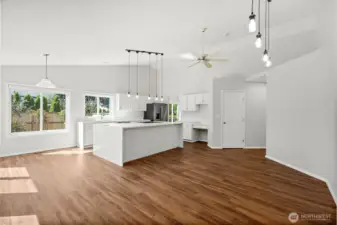 Your standing in the far corner of either what can be used as a Family Room or Eating area looking back into the kitchen. This area is 11' x 17'.