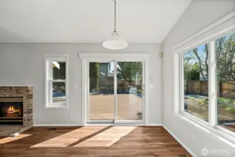 Here is the Breakfast Nook again but from a different angle looking directly out on the deck. Notice the gas fireplace.