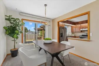 A newer Slider and Windows appoints this home and Updated Modern Lighting accents the Dining.