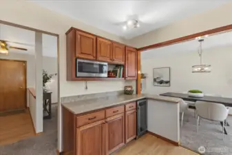 Newer Upper soft close cabinets and the Beverage Cooler were added when the kitchen was updated with the Stainless appliances, Quartz Counters & LPV flooring.