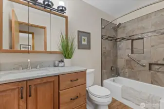 Main Bath is updated with full Tile Surround and Quartz Counters.