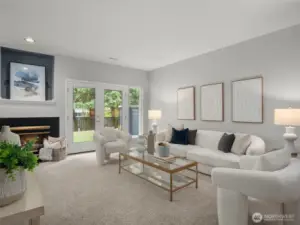 Living room has french doors leading out to patio