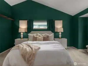 Primary bedroom w vaulted ceiling