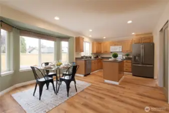 Enjoy morning coffee in the sunny eating nook framed by a charming bay window. It’s a cheerful spot to start your day or enjoy casual meals.
