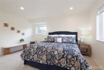 The spacious Primary Suite is delighful with lots of natural light and soft, brand new carpet underfoot!