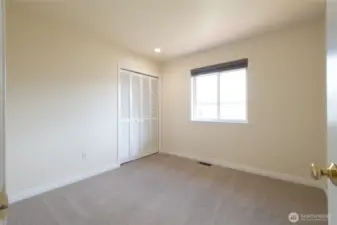 Bedroom #3, Secondary bedrooms provide flexibility for guests, or even a home office. Each space is filled with natural light and comfort.