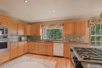 Sunlight pours in through the large window, creating a bright, cheerful space you’ll love to cook and create in.