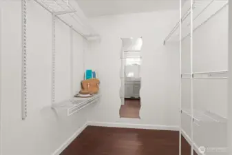 Primary suite walk-in closet offers generous space, ready for your custom closet organizer