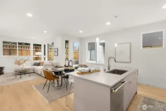 Relax in style with wide-plank flooring and designer lighting that adds a touch of modern warmth.