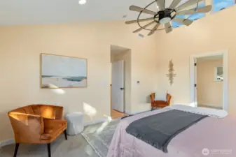 East-facing clerestory windows bath the primary bedroom in morning light