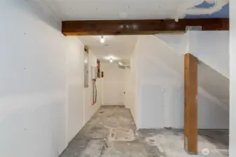 Utility space downstairs offers easy access to high-efficiency utilities, tons of storage, and an additional W/D hookup