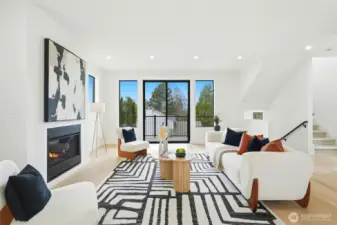 Living area with gas fireplace and covered deck
