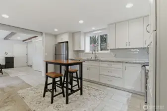 Lower level kitchen is open to large living area