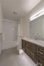 En suite bathroom in 2nd bedroom also has luxury touches. Flating bathroom vanity and toe-kick lighting.