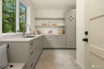 Generously proportioned mudroom located on main level.