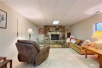 Lower level recreation room with egress window.