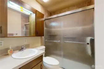 Main Bathroom with tiled shower.