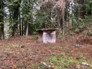 This shed houses the well and pressure tank.