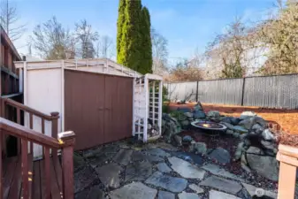 Garden shed in backyard offers great storage.
