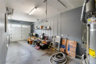 The garage supports one car. The second bay was previously converted to a finished room.