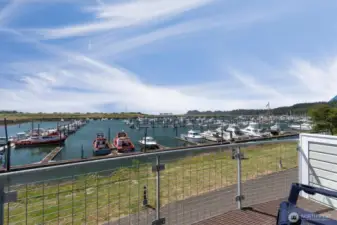 The upstairs apartment has a Trex deck with beautiful views of the Port!