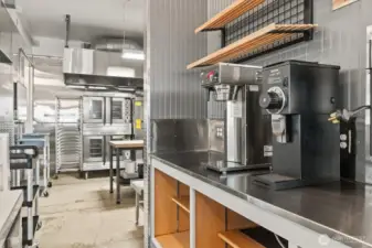A commercial drip coffee maker and commercial grinder is included.