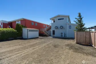 The rear of the building has parking for staff.