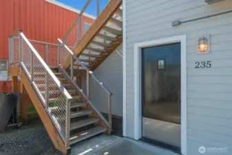 The rear entrance for the upstairs apartment.