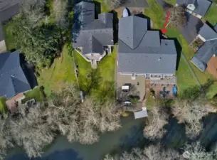 Beautiful, landscaped yard with private dock and firepit