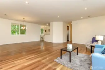 Living room view to kitchen and breakfast alcove.