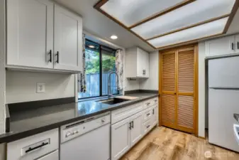 Unit A Kitchen - Recently Remodeled, New Cabinets, Countertops, Sink, Stove, Microwave, and Refrigerator