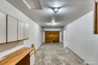 Unit A Garage with Work Bench and Cabinets