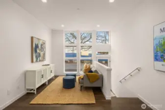 Livingroom features new window treatments and a minisplit for heating and cooling.