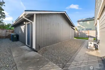 Detached 4 car tandem garage.